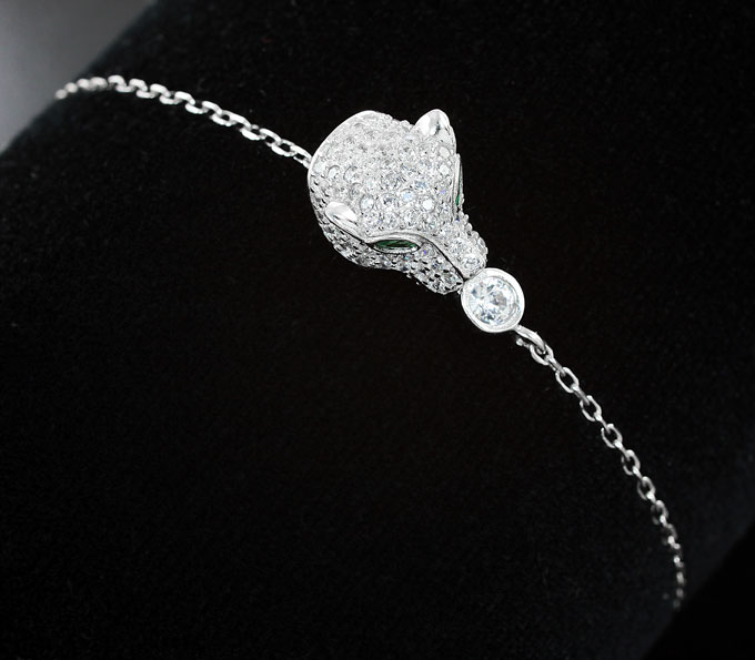 Серебряный браслет «Тигр» с зеленым и бесцветным кубиком циркония