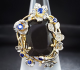 Золотое кольцо с крупным черным турмалином 17,87 карат и синими сапфирами Золото