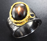 Серебряное кольцо cо звездчатым солнечным камнем и насыщенно-синим сапфиром Серебро 925