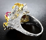 Серебряное кольцо с рубинами и перидотами