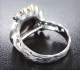 Серебряное кольцо с аммолитом аммонита и цаворитами