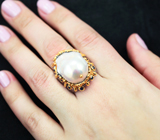 Серебряное кольцо с жемчжиной барокко и синими сапфирами