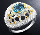 Серебряное кольцо с голубым топазом и перидотом Серебро 925