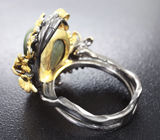 Серебряное кольцо cо скаполитом с эффектом кошачьего глаза и перидотами Серебро 925