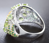 Оригинальное серебряное кольцо с перидотами и пурпурными шпинелями Серебро 925
