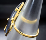 Золотое кольцо с петерситом 8,57 карата и лейкосапфирами Золото