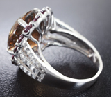 Стильное серебряное кольцо с империал топазом и родолитами Серебро 925