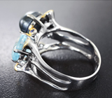 Серебряное кольцо с голубым топазом, звездчатым и синими сапфирами Серебро 925
