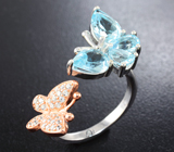 Прелестное серебряное кольцо с голубыми топазами Серебро 925
