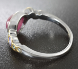 Серебряное кольцо cо звездчатым рубином, танзанитами и синими сапфирами Серебро 925