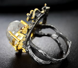 Серебряное кольцо с рутиловым кварцем и мозамбикскими гранатами