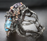 Серебряное кольцо с аметистом, голубым топазом и гранатами Серебро 925