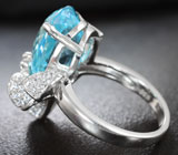 Эффектное серебряное кольцо с голубым топазом Серебро 925
