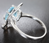 Серебряное кольцо с голубым топазом и разноцветными сапфирами Серебро 925