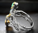 Серебряное кольцо с кристаллическими эфиопскими опалами 5,54 карата, родолитами и диопсидами
