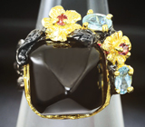 Серебряное кольцо с черной шпинелью, голубыми топазами и родолитами Серебро 925