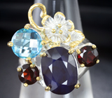 Серебряное кольцо с насыщенно-синим сапфиром, голубым топазом и гранатами Серебро 925