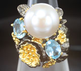 Серебряное кольцо с жемчужиной и голубыми топазами