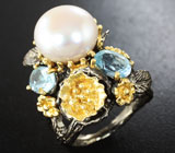 Серебряное кольцо с жемчужиной и голубыми топазами Серебро 925