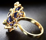 Золотое кольцо с крупным кабошоном танзанита топового цвета 10,13 карата и бриллиантами Золото