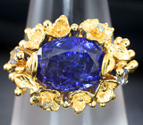 Золотое кольцо с крупным бархатисто-фиолетовым танзанитом 5,19 карата и бриллиантами Золото