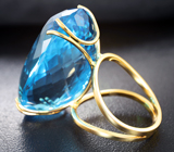 Золотое кольцо с чистейшим крупным ярко-голубым топазом 73,3 карата Золото