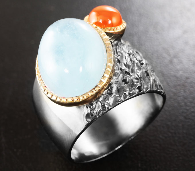 Серебряное кольцо с аквамарином 8+ карат и карнелианом