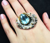 Серебряное кольцо с голубым топазом 16,78 карата и синими сапфирами Серебро 925