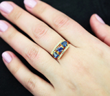 Золотое кольцо с насыщенными синими сапфирами авторской огранки 1,51 карата и бесцветными цирконами Золото