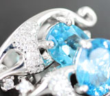 Прелестные серебряные серьги с голубыми топазами Серебро 925