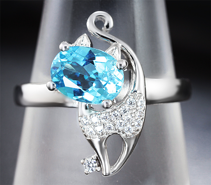 Прелестное серебряное кольцо с голубым топазом