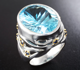 Серебряное кольцо с голубым топазом лазерной огранки 20,58 карата и синими сапфирами Серебро 925