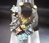 Серебряное кольцо с лемотрином 12+ карат, голубыми топазами и мозамбикским гранатом Серебро 925