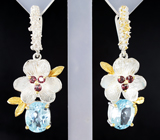 Серебряные серьги с голубыми топазами и мозамбикскими гранатами Серебро 925