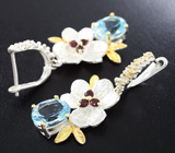 Серебряные серьги с голубыми топазами и мозамбикскими гранатами Серебро 925