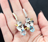 Серебряные серьги с голубыми топазами и мозамбикскими гранатами Серебро 925