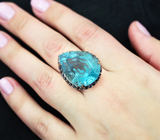 Серебряное кольцо с голубым топазом лазерной огранки 40,51 карата и синими сапфирами Серебро 925