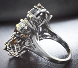 Серебряное кольцо с цитрином мадейра, звездчатым сапфиром, голубыми топазами и иолитами Серебро 925
