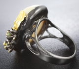 Серебряное кольцо с пастельно-желтым опалом и перидотами Серебро 925
