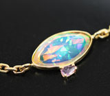 Золотой браслет с кристаллическим эфиопским опалом авторской огранки топовых характеристик и розовым сапфиром Золото