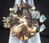 Серебряное кольцо с дымчатым кварцем лазерной огранки 23+ карат и голубыми топазами Серебро 925