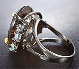 Серебряное кольцо с дымчатым кварцем лазерной огранки 23+ карат и голубыми топазами Серебро 925