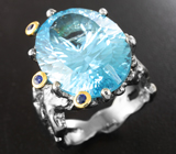 Серебряное кольцо с голубым топазом лазерной огранки 15,48 карата и синими сапфирами Серебро 925