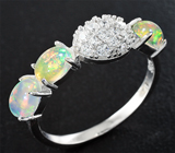 Прелестное серебряное кольцо с кристаллическими эфиопскими опалами  Серебро 925