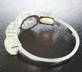 Прелестное серебряное кольцо с кристаллическими эфиопскими опалами  Серебро 925