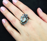 Праздничное  серебряное кольцо с голубым топазом и разноцветными сапфирами Серебро 925