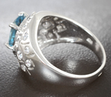Стильное серебряное кольцо с голубым топазом и синими сапфирами Серебро 925