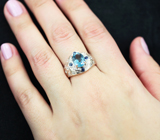 Стильное серебряное кольцо с голубым топазом и синими сапфирами Серебро 925