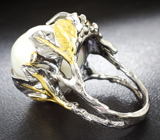 Серебряное кольцо с жемчугом барокко 32,32 карата и синими сапфирами