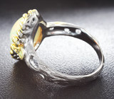 Серебряное кольцо с кристаллическим эфиопским опалом 3,84 карата и зеленым сапфиром Серебро 925